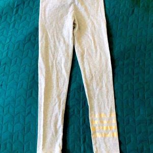 Gray tights With gold stripes